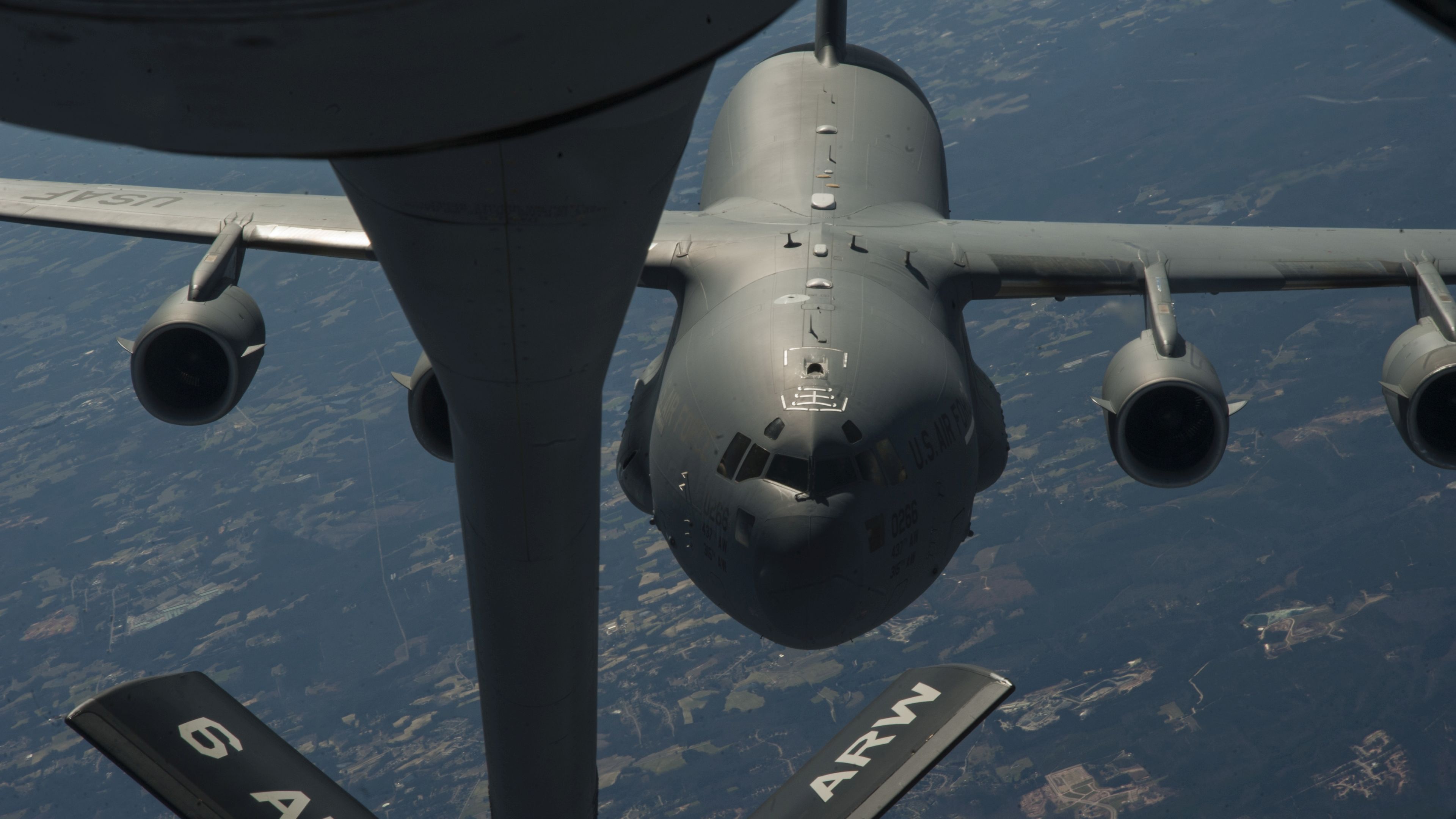 C-17 Globemaster III approaches a KC-135 Stratotanker