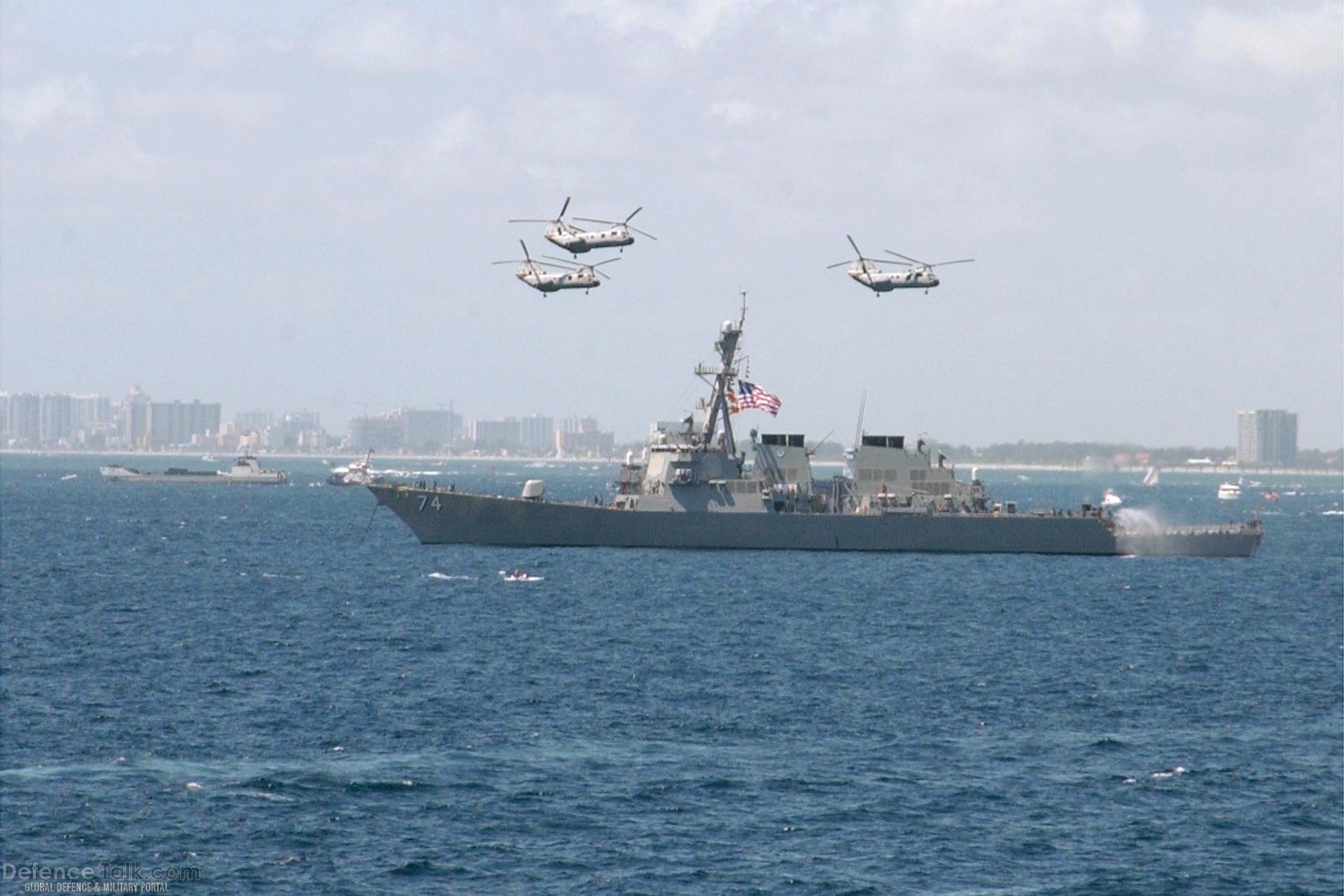 CH-46 transport helicopters fly over DDG 74 - US Navy