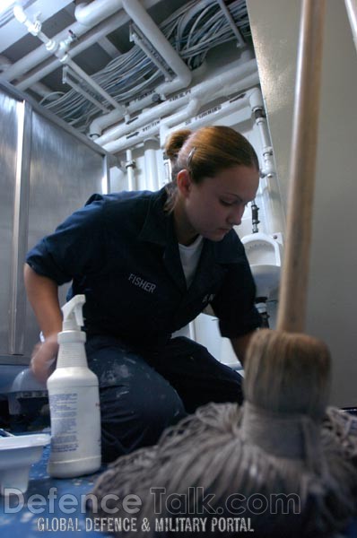 Cleaning Austin-class amphibious transport dock ship