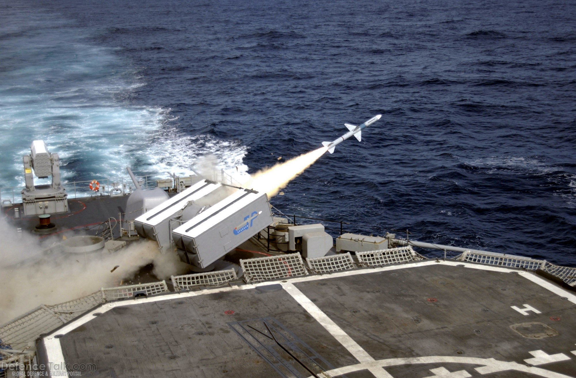 DDG 991 fires a Sea Sparrow surface-to-air missile - US Navy