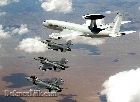 F-16s guarding a AWACs E-3 Aircraft.