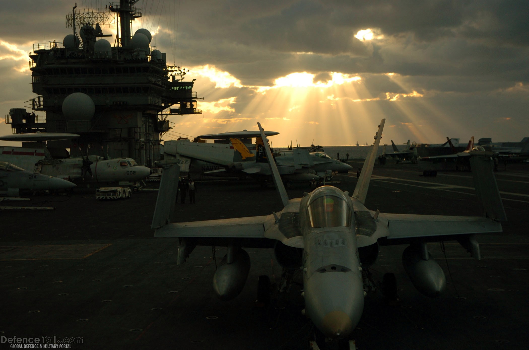 F-18 and Sunset on USS Kitty Hawk (CV 63) Aircraft Carrier