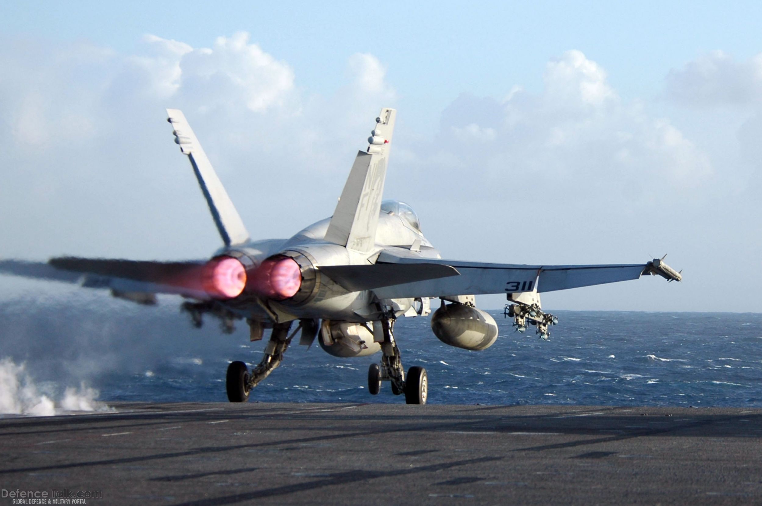 F-18 Takes off from USS Kitty Hawk (CV 63)