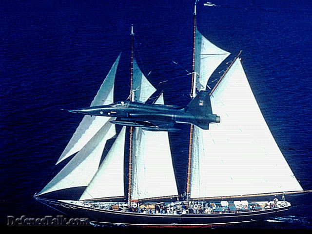 F-5 passing a ship.