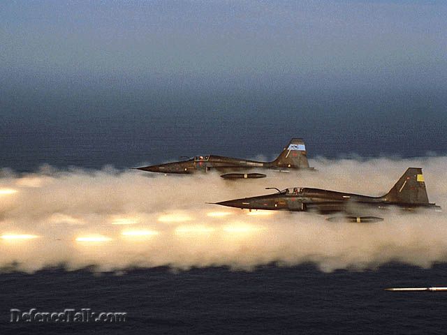 F-5 tiger pair firing. Canadian Air Force (edited by Red aRRow)
