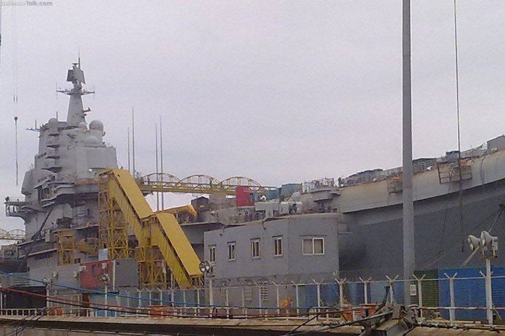 Full view of the new Chinese PLAN aircraft carrier from the starboard bow