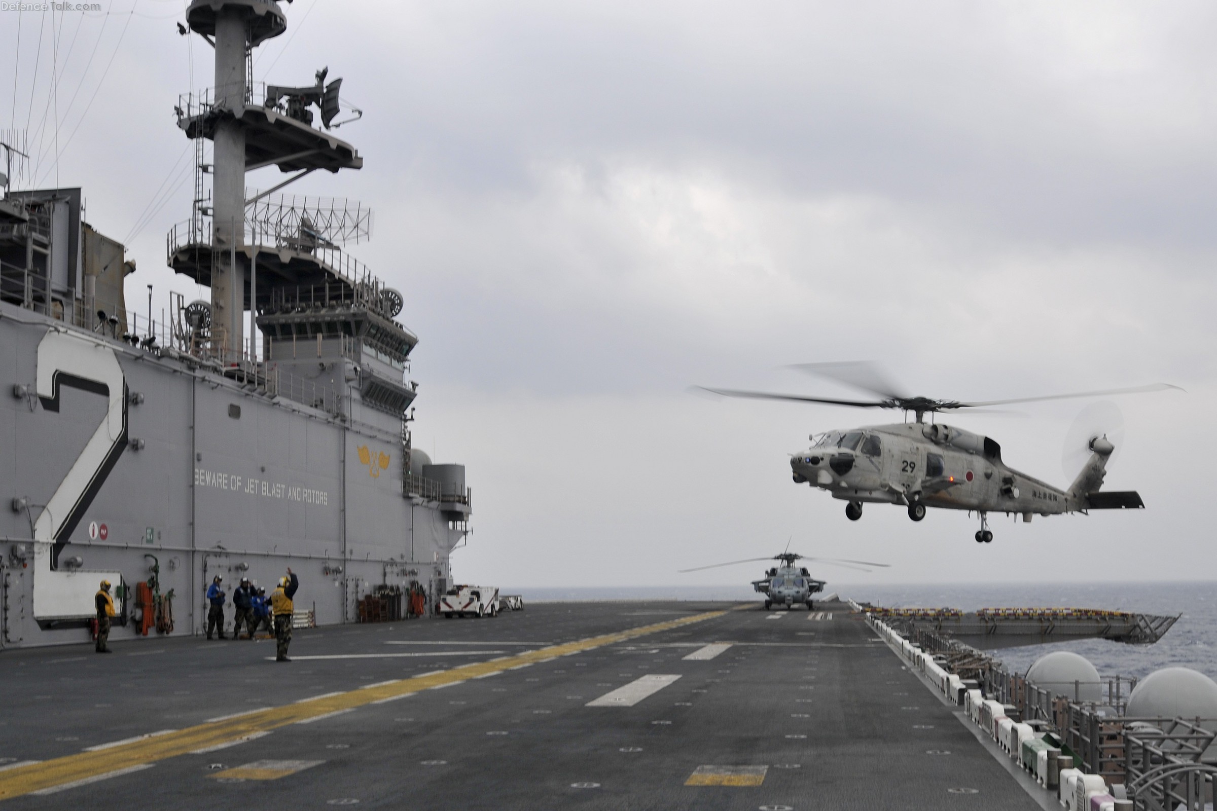 JMSDF SH-60K Sea Hawk helicopter Lands, LHD 2