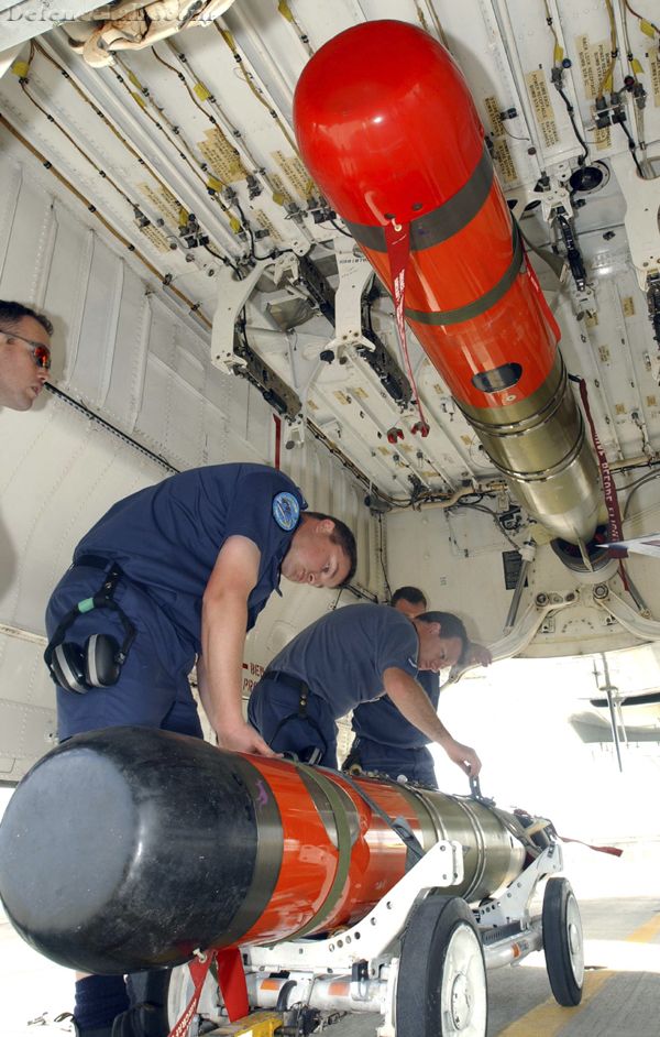 Live Torpedo's being loaded into Aussie AP-3C Orions at Rimpac 2004