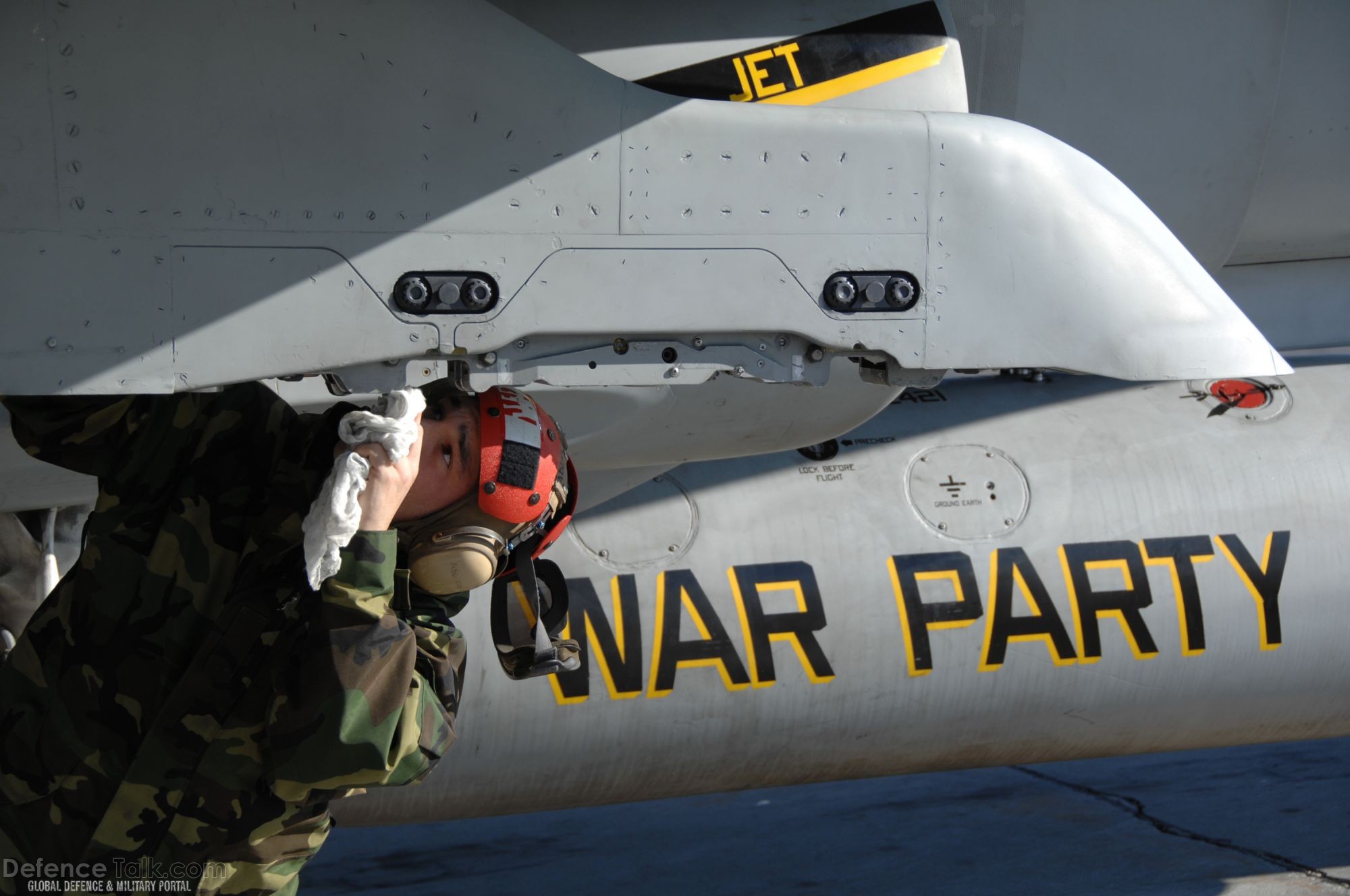 Maintenance on a Navy F/A-18- US Air Force Exercise