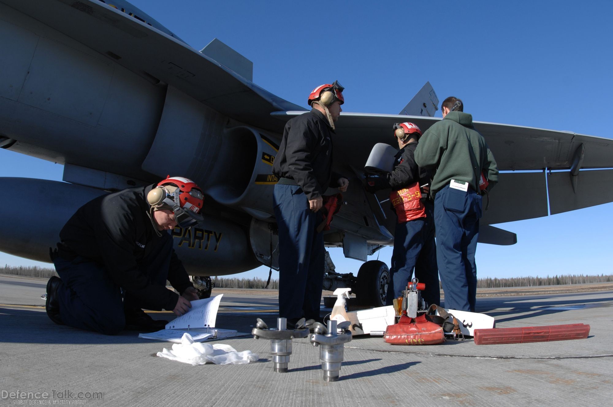 Maintenance on a Navy F/A-18- US Air Force Exercise