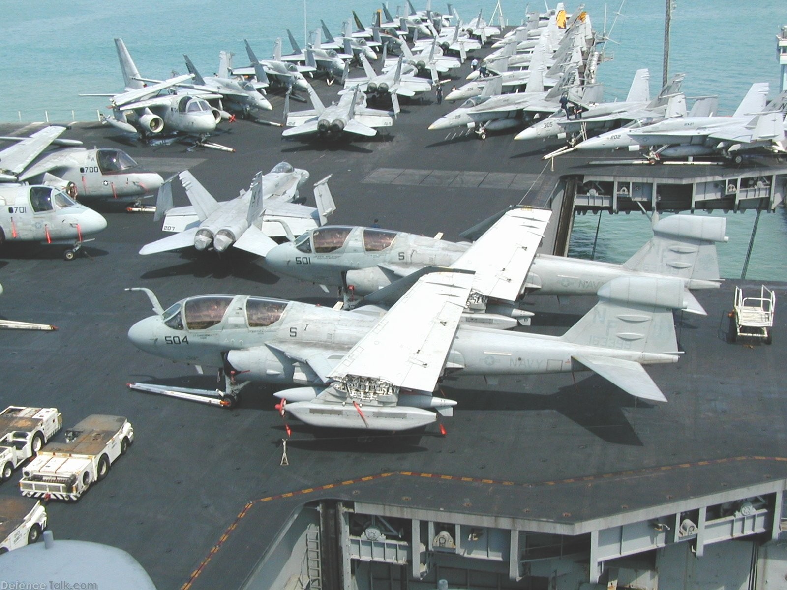 Prowlers and F/A-18C's on USS Kitty Hawk in Singapore 2002