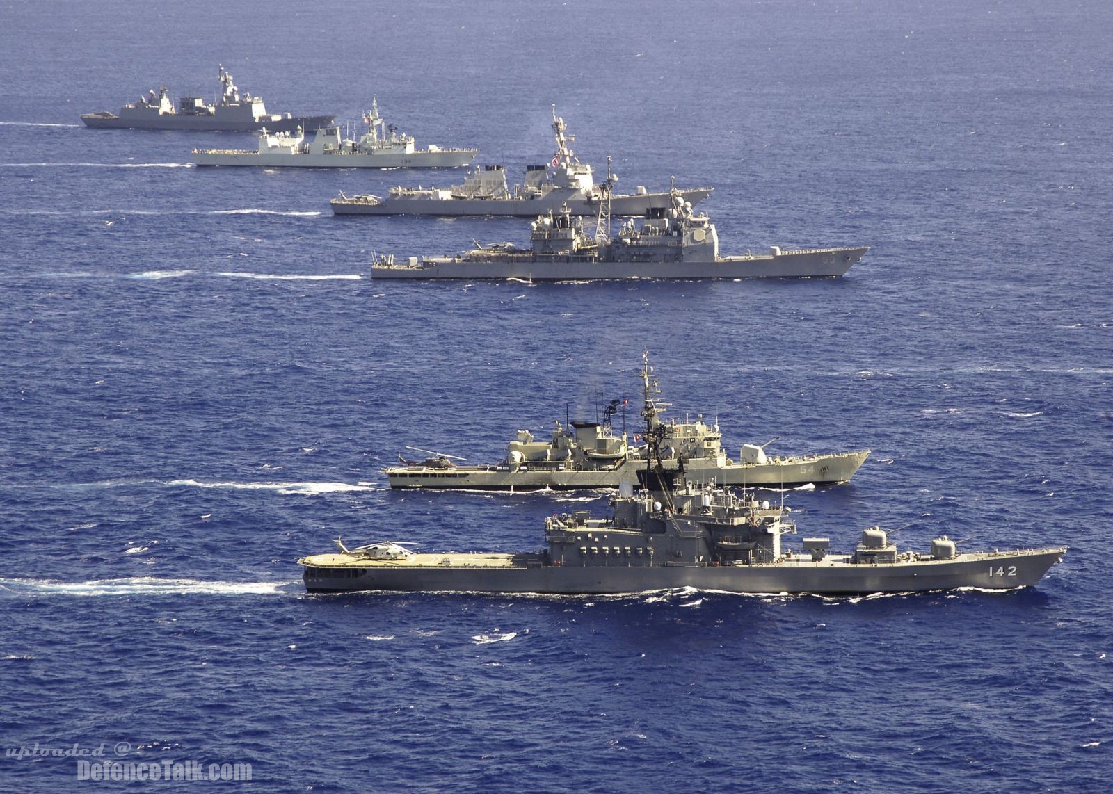Ships from the participating nations of the multinational Rim of the Pacifi