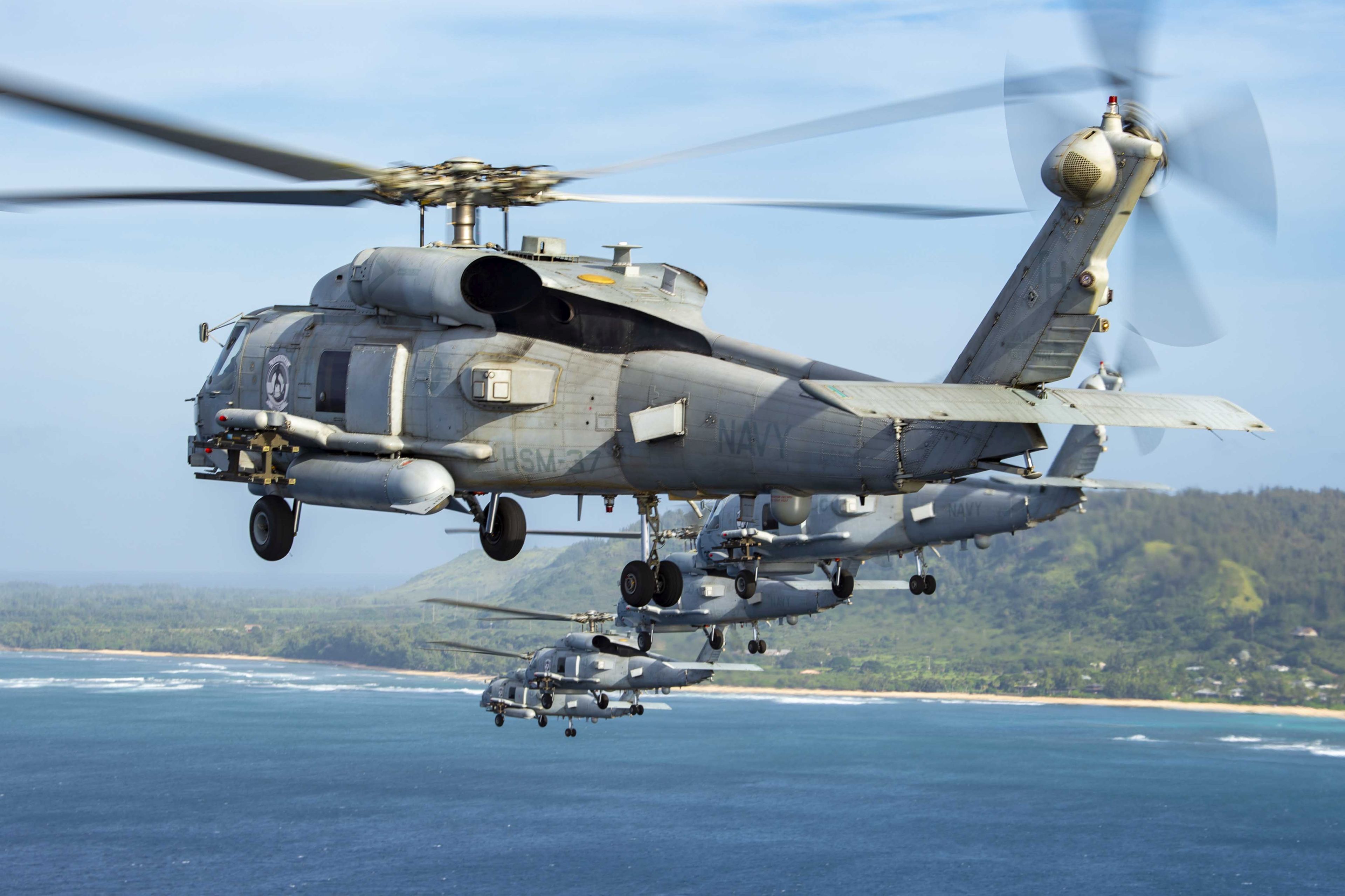US Navy MH-60R Seahawk Helicopters Fly In Formation