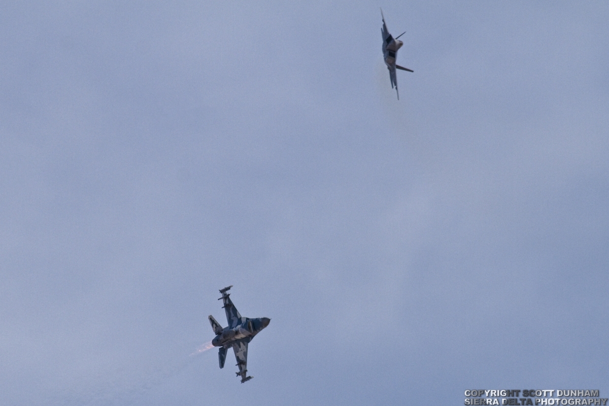USAF-16 Aggressor with F-22A Raptor in chase