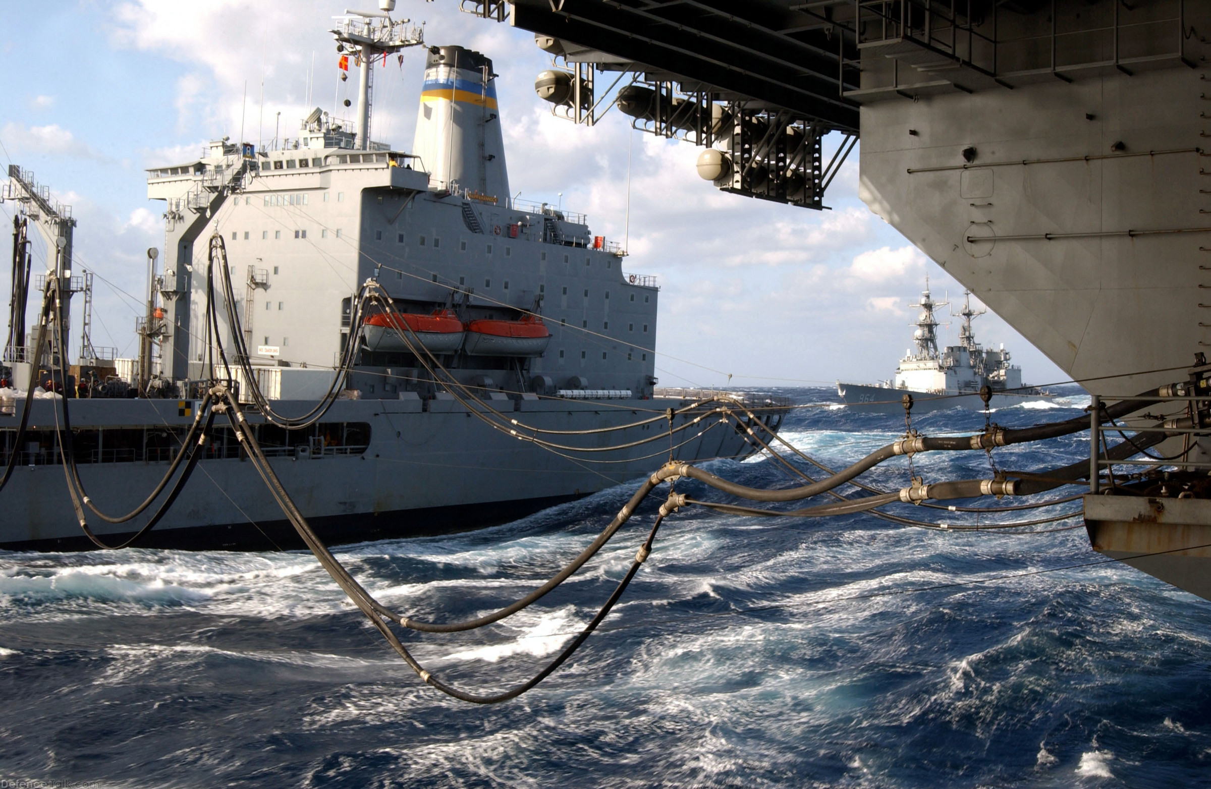 USS Paul F. Foster (DD 964) approaches CV 63