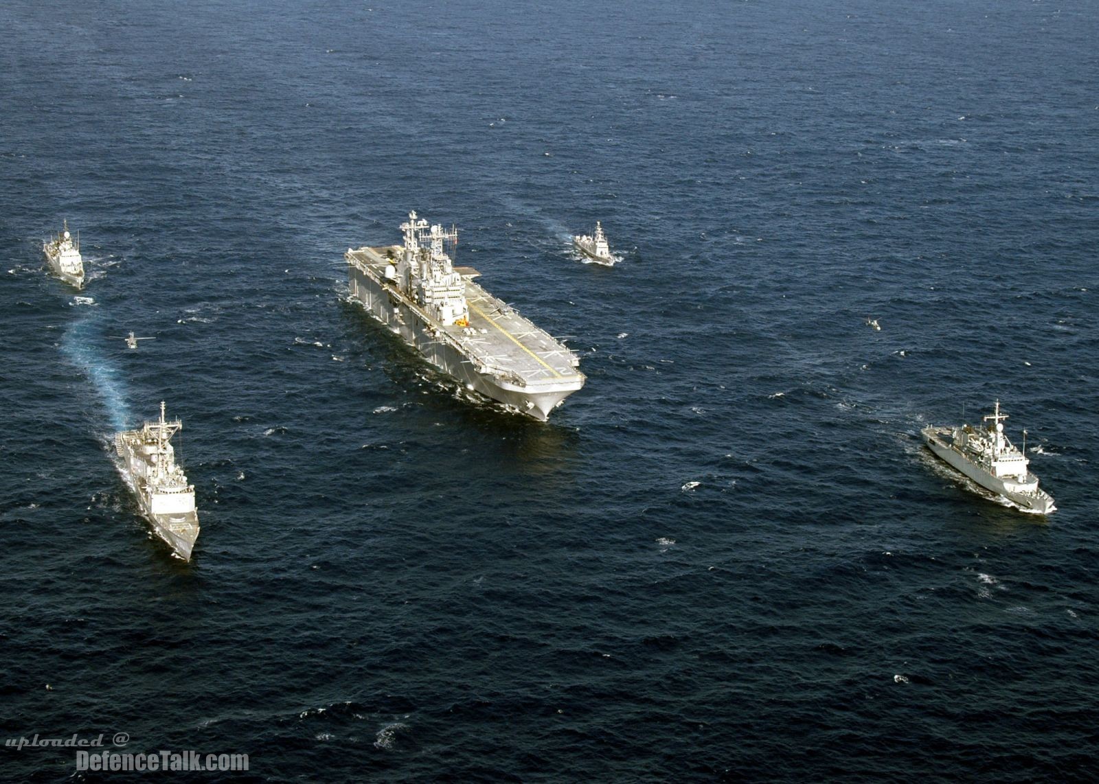 USS Saipan (LHA 2) and guided-missile frigate USS Simpson (FFG 56)