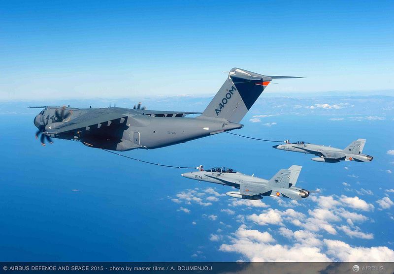 A400M‬ refuels two F-18 fighters simultaneously