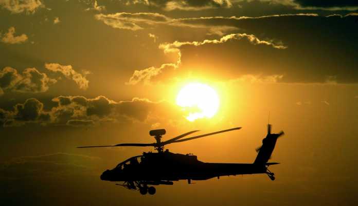 APACHE HELICOPTER LANDS IN THE SOUTH OF NAJAF AH-64 Apache combat helicopter