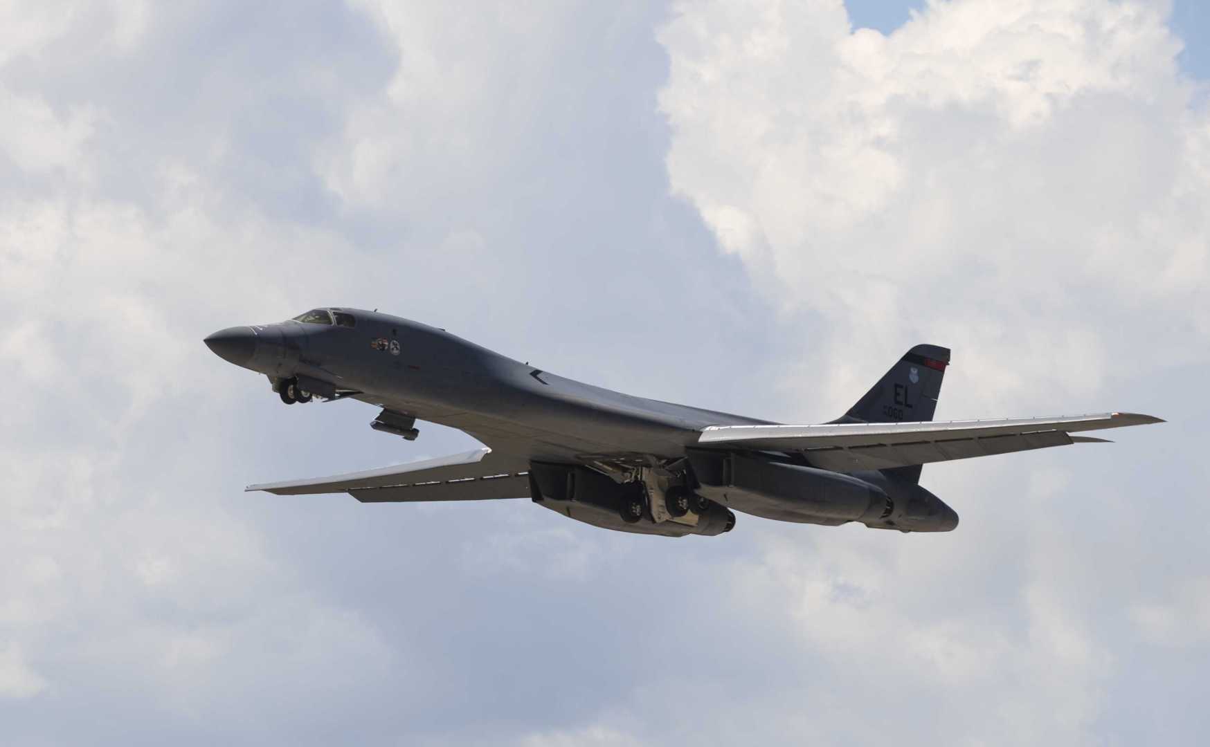 A B-1 bomber soars through the sky during suppression of enemy air defenses training at Ellsworth Air Force Base, S.D., July 15, 2016. During SEAD missions, bombers are used offensively to destroy targets while EA-18G Growlers work as a supporting aircraft to deny, degrade or delay the enemies’ ability to acquire and engage friendly air forces and also give bombers access to those targeted areas. (U.S. Air Force photo by Airman 1st Class Sadie Colbert/Released)