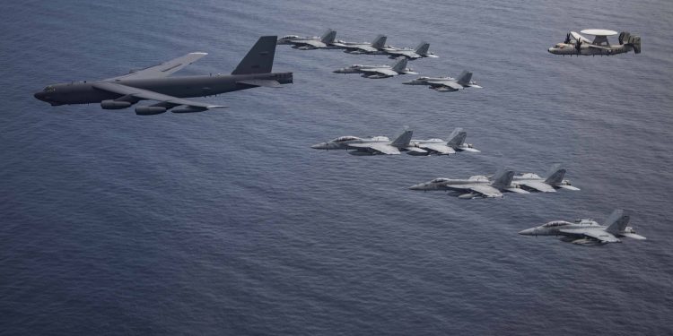 US Sends B-52 Bomber Over South China Sea as China Steps up Naval Drills