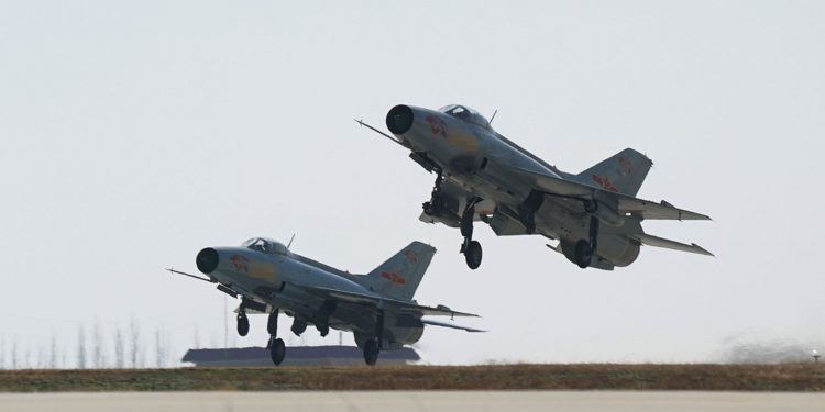 One dead after fighter jet crashes into homes in central China