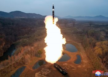 North Korea says it test-fired new solid-fuel hypersonic missile