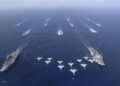 China says holds first dual aircraft carrier drills in South China Sea