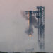 In a first, SpaceX ‘catches’ megarocket booster after test flight